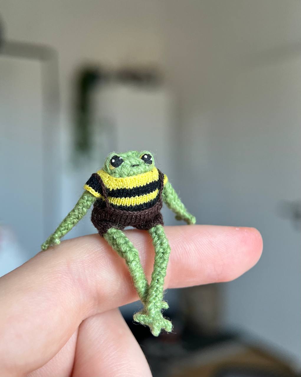 Mini crochet frog in a Bee Outfit
